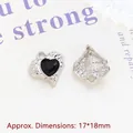 Macro shot of 17x18mm silver heart pendant with black gemstone and textured metal back - 15# Black Heart Gemstone Pendant