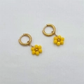 Handmade golden hoop earrings with yellow beaded daisy charms for women - Yellow