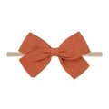 Terracotta bow headband made of soft textured fabric with elastic nylon band for babies - Orange Red