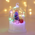 Macro shot of a Christmas snow globe light with a mini tree and colorful LED lights - Style D (Colorful Light)
