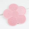 Pink petal-shaped silicone makeup brush cleaning mat with various deep-clean textures - Light Pink