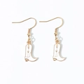 Creative western cowboy boot earrings with white enamel and golden star details - Earring Hooks / White