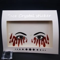 Halloween face crystal sticker featuring red glitter blood tear design in window packaging - 009