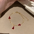 Pulsera dorada con colgantes Wulu rojos brillantes y piedras de circonita engastadas - Dorado-Rojo