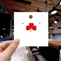 Cute red four-leaf clover enamel brooch pin with gold plating on a white display card - 98*Red Three Leaf Clover Pin
