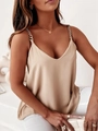 Detailed view of women's beige satin tank top featuring elegant gold chain straps - S / Khaki