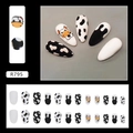 Cute almond press-on nails with black and white cow patterns and cartoon cow art - Cute Cow (R795)