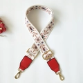 Detail of adjustable floral strap with red leather ends and golden metal hardware clips - White Brown Floral + Red Leather (Silver Hook)