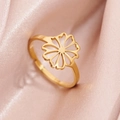 Adjustable hollow daisy flower ring in gold-plated stainless steel on pink silk background - Hollow Floral C-Gold (284 Gold)
