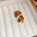 Macro shot of Maillard geometric amber resin earrings with gold metal in a jewelry box - 6# Silver Pin-Gold-Brown-Semi-circular Amber