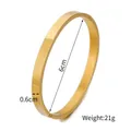 Polished gold stainless steel cuff bracelet with 6cm inner diameter and 0.6cm width - 6mm Gold
