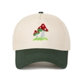 Close-up of mushroom embroidery on a vintage color-block five-panel trucker baseball cap - Adjustable / Army Green