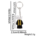 Acrylic graduation gown keychain featuring black robe design and golden Grad text - Grad Academic Gown Style