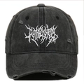 Detail of Gothic washed black baseball cap featuring white embroidery and distressed holes - Black