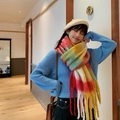 Close-up of thick winter scarf featuring colorful rainbow plaid pattern and long fringe - No.14 Red Yellow Plaid