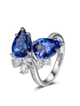 Luxuriöser offener Ring mit zwei birnenförmigen blauen Saphiren und weißen Zirkonia-Steinen - Einstellbar Offen / Blau