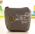 Vintage grey canvas coin purse with bronze bicycle charm and retro stamp print detail - Grey Bicycle