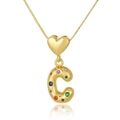 Macro shot of gold heart necklace with colorful zircon encrusted letter C pendant - Letter C