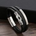 Bracciale multistrato in pelle nera intrecciata con chiusura a nodo argentata - Nero/Argento