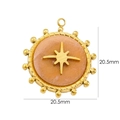 Detailed view of a 20.5mm gold stainless steel sunburst pendant with peach gemstone - Sunstone