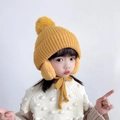 Yellow kids winter knit hat with pom-poms and fleece ear flaps for warmth - One Size(Elastic) / Yellow