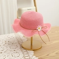 Detailed view of pink woven straw hat with daisy decor and lace wavy brim trim - 54cm / Hat / Watermelon red