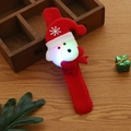 LED Christmas slap bracelet featuring plush Santa Claus on a festive wooden background - Red Bear - With LED