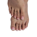 Minimalist golden wavy toe rings set shown on feet with elegant French manicure - French Pink White Glue Style (JCY-06)