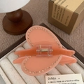 Pinza per capelli Y2K a cuore rosa pesca con strass e molla dorata in portagioie - Cuore Arancione