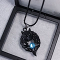 Detailed view of retro black metal wolf head pendant with blue gem in a gift box - Black Wolf Head Blue Gem
