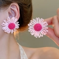 Pink daisy earrings featuring hand-woven raffia petals and dark pink beaded flower centers - 36# Pink Woven Daisy with Magenta Center Stud Earrings (Silver Earring Post)