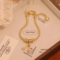 Bracciale a catena serpente placcato oro 18K con ciondoli Torre Eiffel e fotocamera rosa - Stile Torre Eiffel e Fotocamera (1# Torre)
