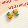DIY goldfish glass bead charm with orange body and green tail and gold metal ring - 3D Color Matching Fish / Orange Yellow and Green
