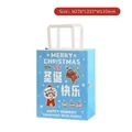Blue Christmas paper gift bag with gingerbread man and candy graphics, 27x21x11cm - Christmas Candy (Sky Blue)