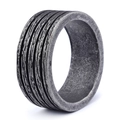 Macro view of wide dark grey industrial ring with vintage textured metal finish - Industrial Texture Style (14404)