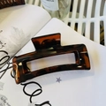 Detailed view of large tortoiseshell rectangle hair claw clip on a minimalist white backdrop - 12.5CM / Shiny Tortoiseshell