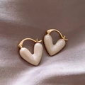 Macro shot of gold-plated heart-shaped pearl earrings on a premium silk fabric background - 6# Pearl White Heart Ear Clip (Real Gold Plated)