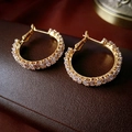 Macro detail of luxury gold hoop earrings with pavé set square cubic zirconia stones - Square Zircon Hoop Earrings / Gold