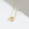 Collier pendentif sac d'argent doré avec un charme de signe dollar rose vif - Rose