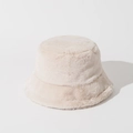 Close-up of soft beige faux fur texture on a warm winter bucket hat for women - Beige