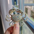 Luxurious gold crab brooch with colorful rhinestones and blue crystal eyes - AB Color