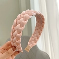 Detail of pink braided satin headband with soft glossy texture and woven design - Pink