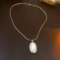 Elegant gold chain necklace featuring an oval mother-of-pearl pendant with gold trim - Real Gold Plated Oval Shell Pendant Style