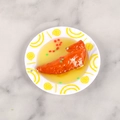 Miniature food model featuring steak with yellow sauce on a spiral white plate - Mini Chicken Wing - No Keychain