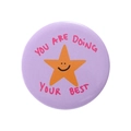 Purple tinplate badge featuring an orange star smiley and You Are Doing Your Best slogan - Purple Smiling Star