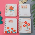 Set of 4 mini A7 spiral notebooks with floral illustrations and festive messages - Cardamom