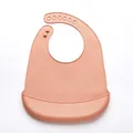Waterproof food-grade silicone baby bib in pale orange with 6-hole adjustable neck strap - Small / Lotus root pink