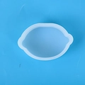 Lemon shape silicone mold for DIY candles and soaps on a blue background - Lemon Shape Mold