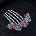 Silver 5-tooth hair comb with pink butterfly rhinestones on a textured background - Silver Pink Butterfly Style 8