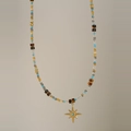 Bohemian stainless steel beaded necklace with a golden North Star pendant and blue crystal - Eight-pointed Star Beaded Style / Gold Brown Blue